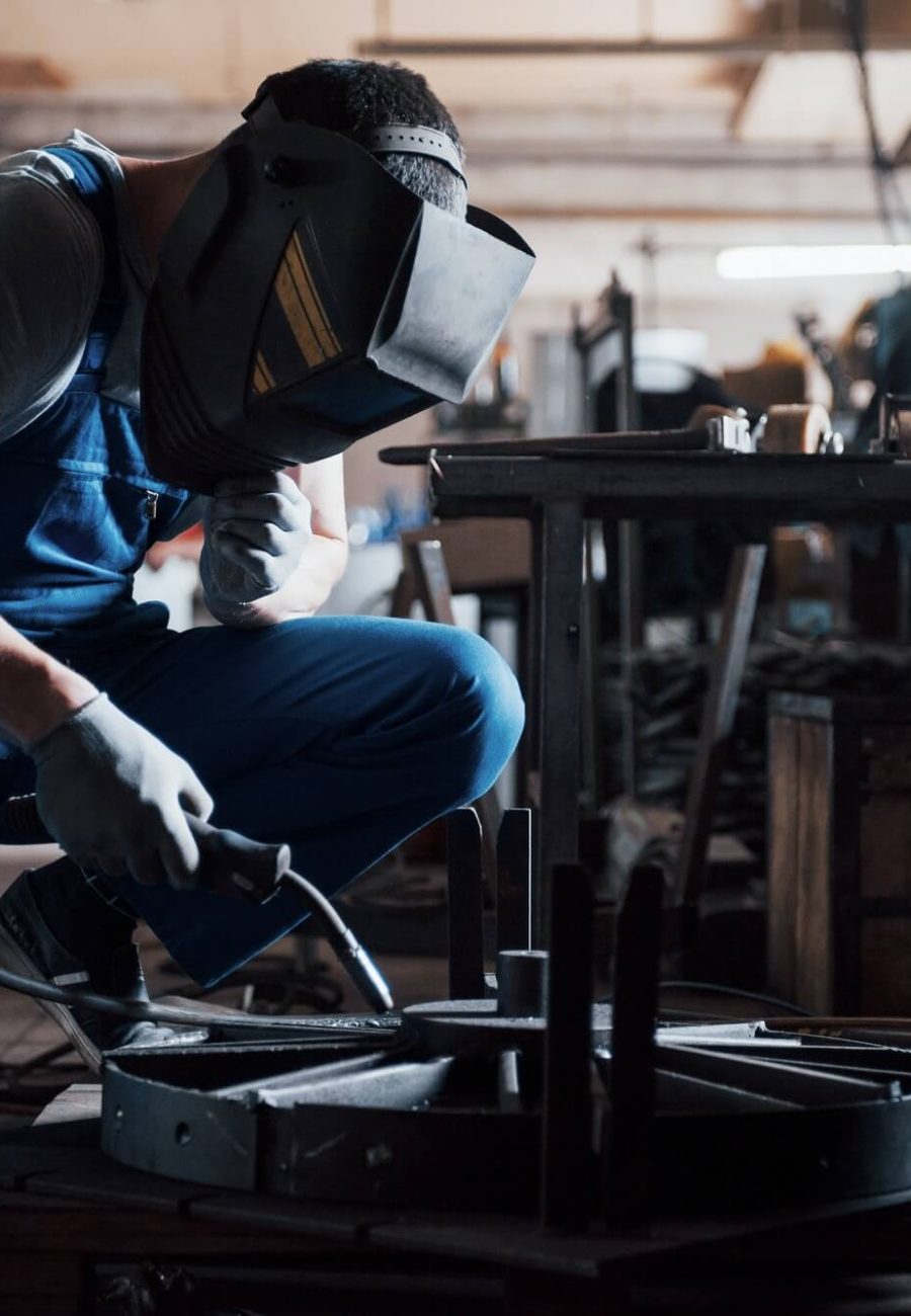 portrait-of-a-young-worker-at-a-large-metalworking-plant-the-welder-engineer-works-in-a-protective-1.jpg